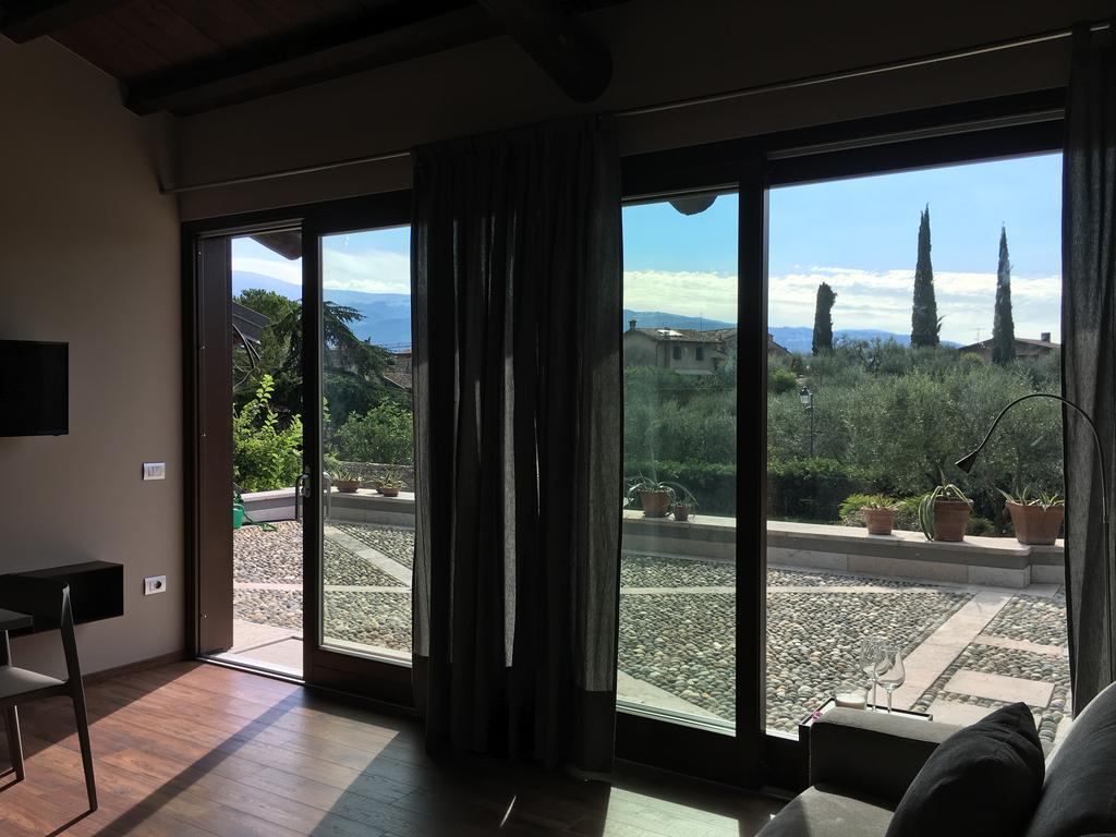 Energaia Apartment Toscolano Maderno Ruang foto